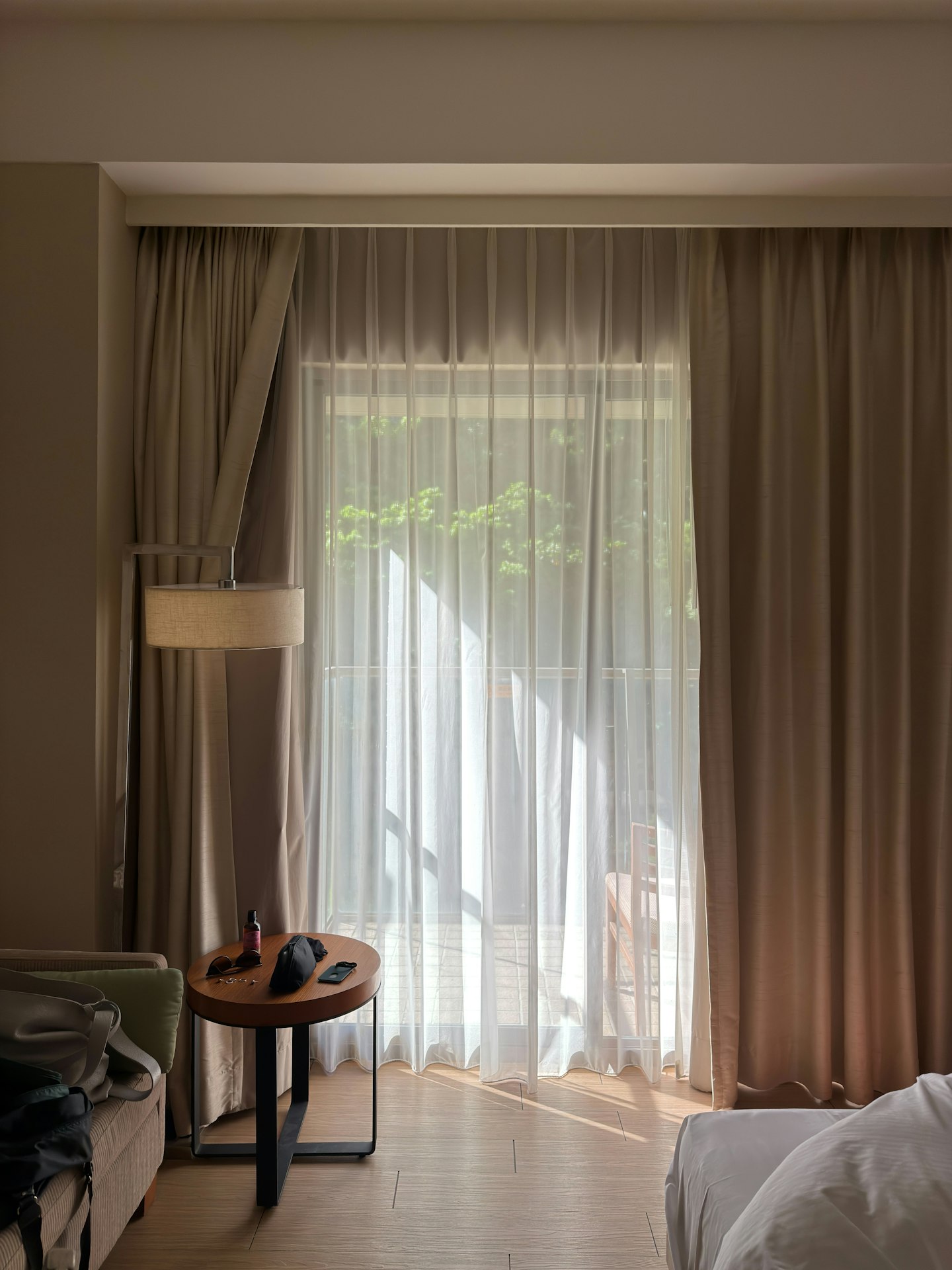 Sunlight streaming through sheer curtains
